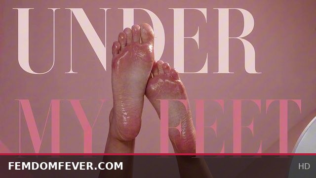 Domme Goddess Rules Her Slave Under Her Feet in Intense Femdom Session